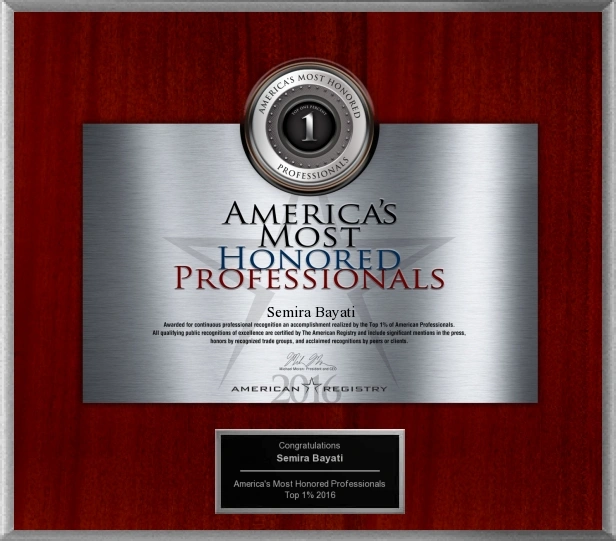 Award plaque recognizing Dr. Sandra Margoles as America's Most Honored Professionals with silver seal on red background