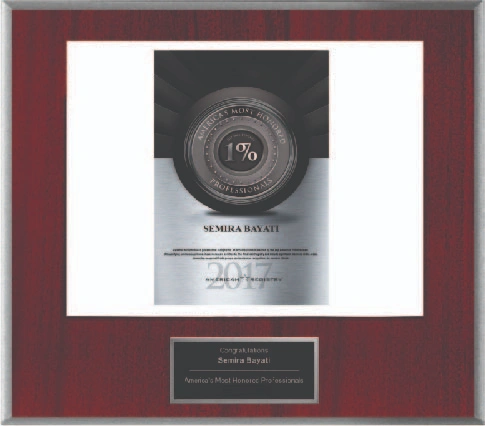 Framed medical achievement award with circular seal and personalized nameplate on burgundy matting